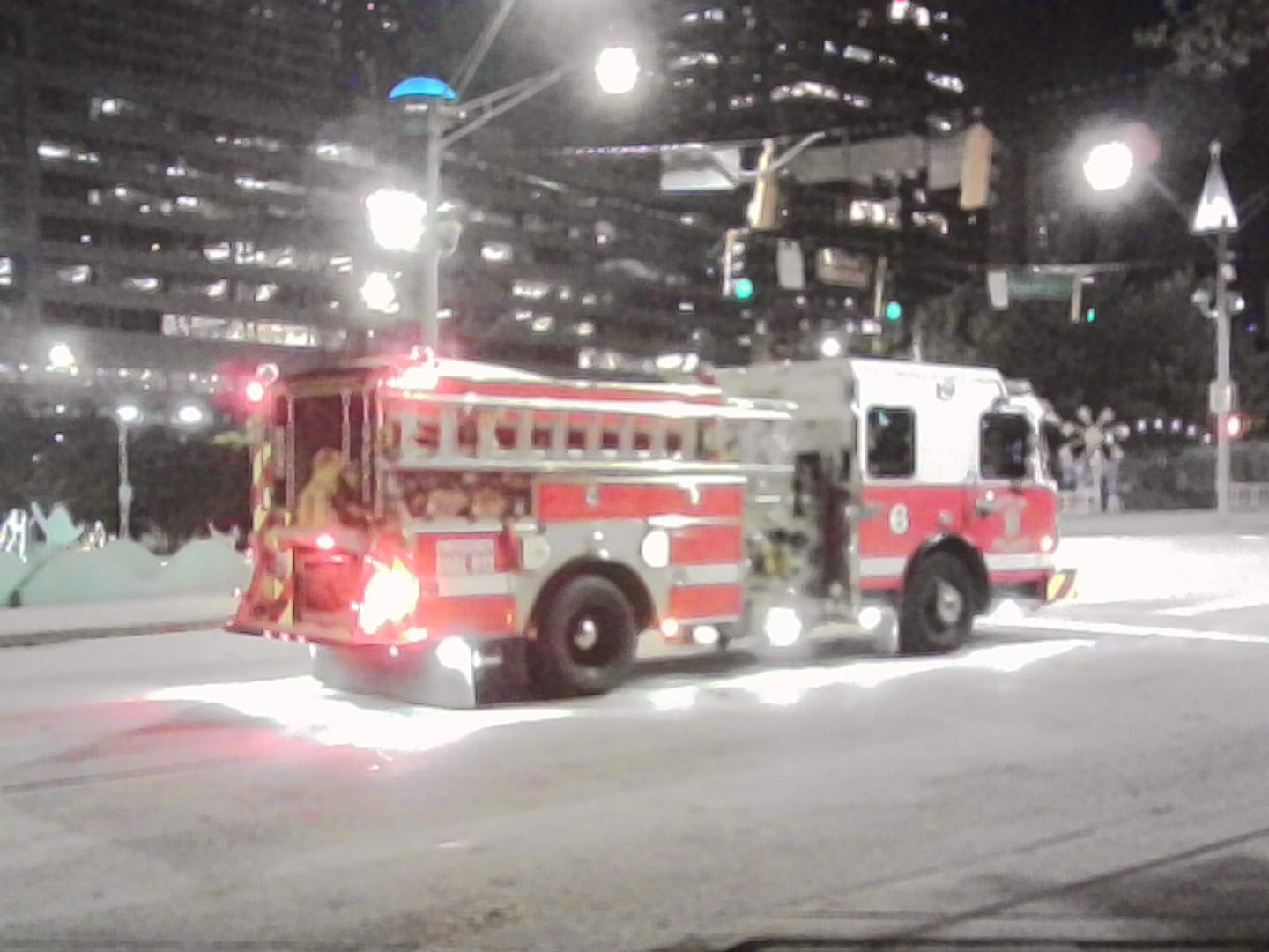 Fire engine at a stoplight.